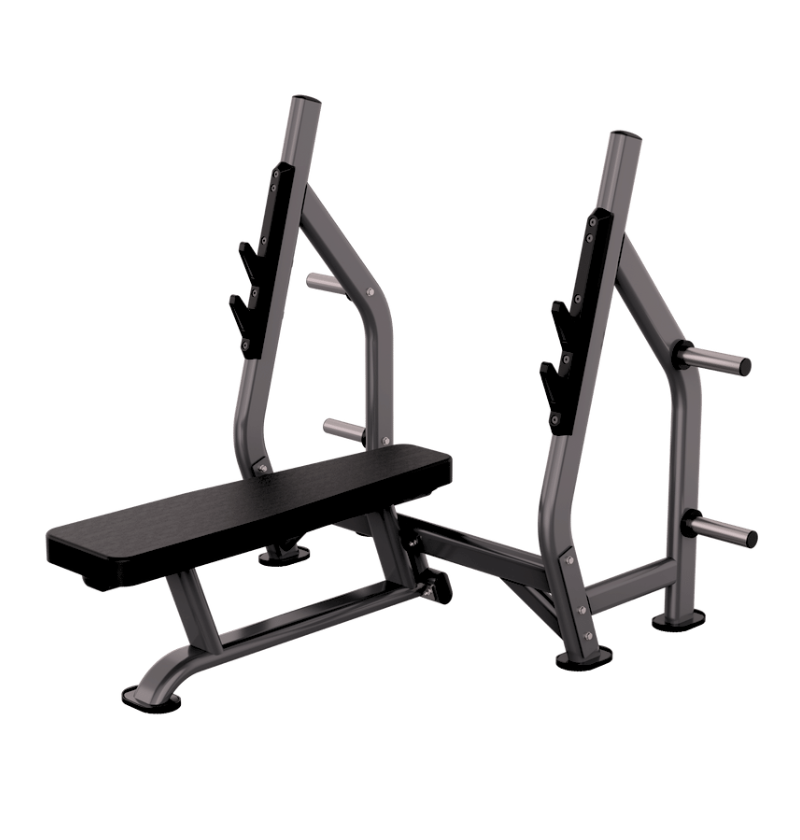 A silver and black weight bench press gym machine with a padded bench, uprights, and safety arms, isolated on a white background.