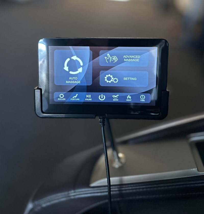 Dashboard display connected to the car, showcasing a massage chair for a relaxing driving experience.