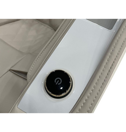 The center console of the car includes a button, which may activate the massage chair.