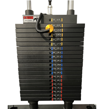 A black and yellow all-in-one half rack with functional trainer, featuring multiple weight plates for strength training.