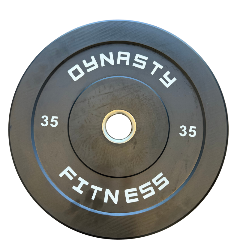 A black rubber weight plate with white lettering that reads 'DYNASTY FITNESS' and '35' on each side, shown on a plain white background.