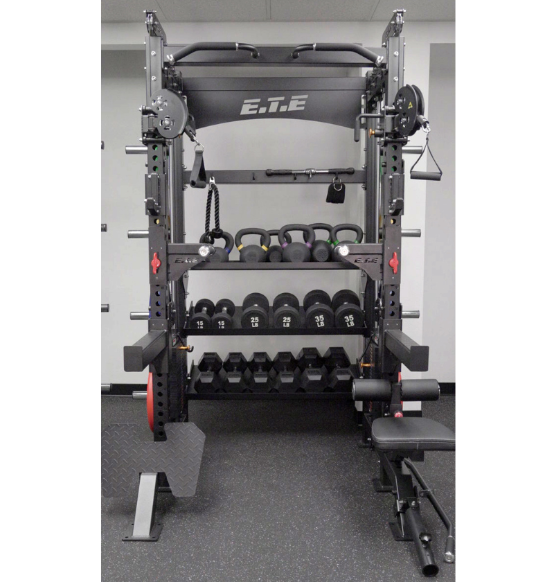 All in 1 Half Rack Functional Trainer with dumbbells in a gym setting