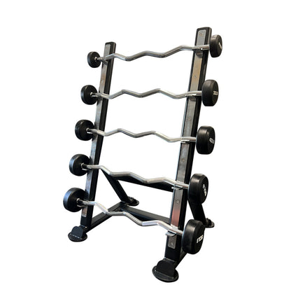 A black and silver fixed curl barbell with marked weight plates and a chrome steel handle displayed on a black metal rack.