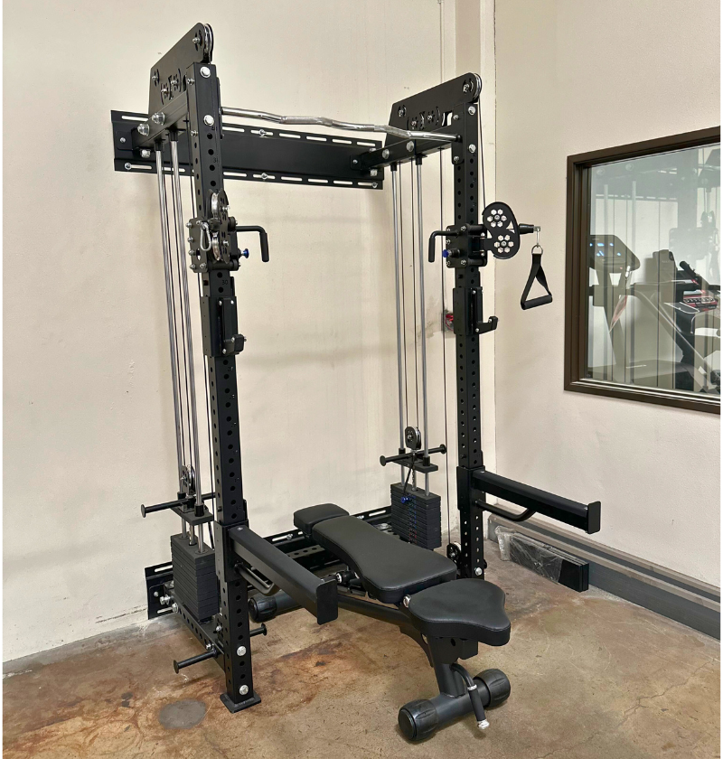 Black wall mounted functional trainer squat rack in a warehouse