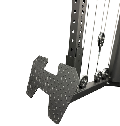 Low row foot plate attachment for a cable machine.