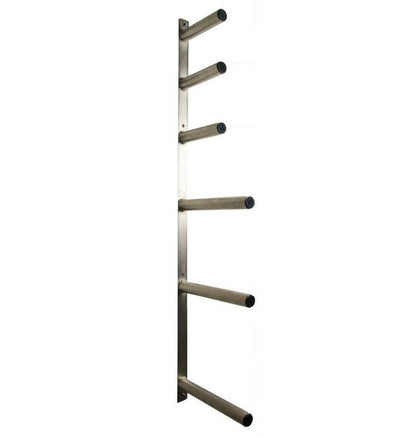 A wall mounted Olympic plate rack with multiple pegs for storing weight plates.