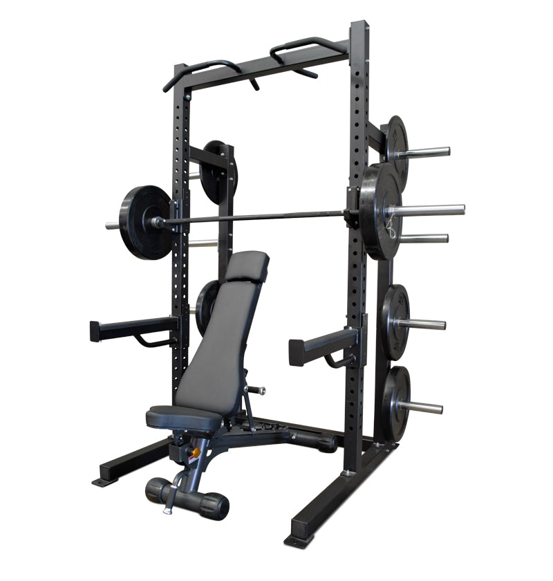 Black Pro Half Rack with a bench and weights, designed for strength training and fitness workouts.