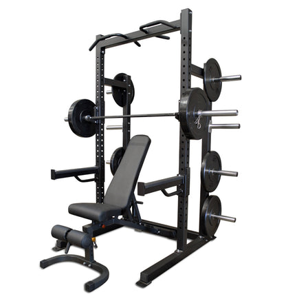 Black Pro Half Rack with a bench and weights, designed for strength training and fitness workouts.