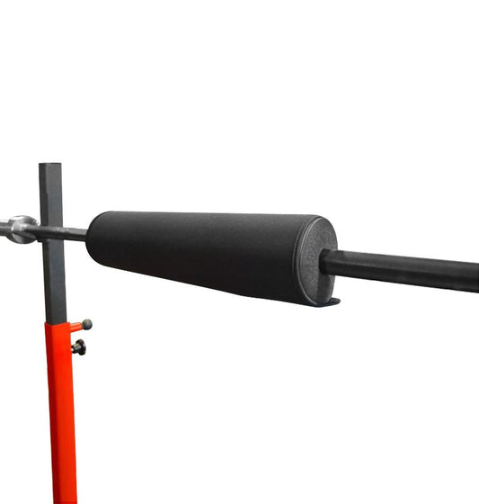 A black squat bar pad attached to a red and black barbell, designed to provide comfort on the lower and upper back during weightlifting.