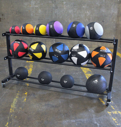 Set of ETE rubber med balls varying in size and weights, displayed on a 3-tier metal rack ideal for storage and saving space. 